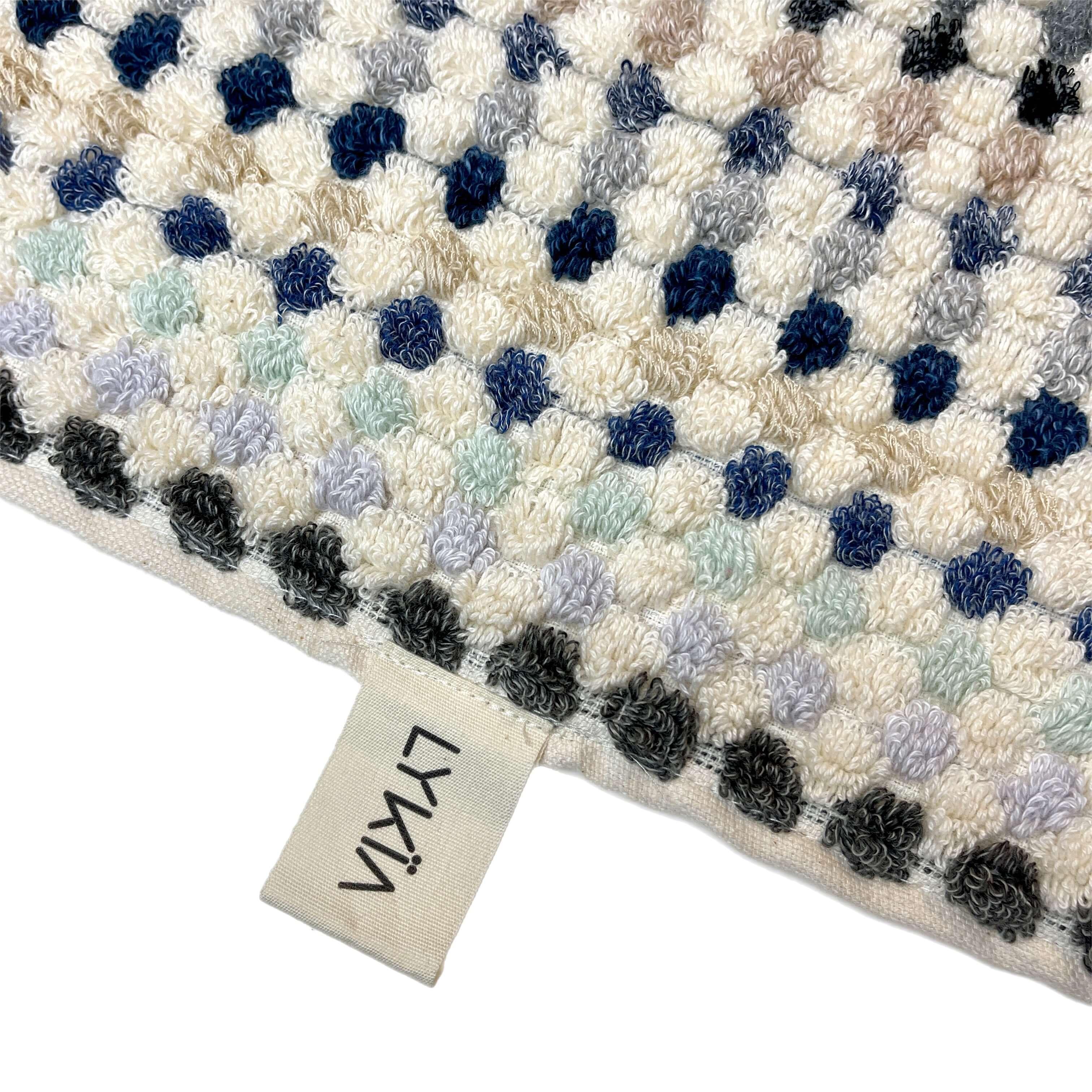 Gæstehåndklæde multi horisont - lykia.dk